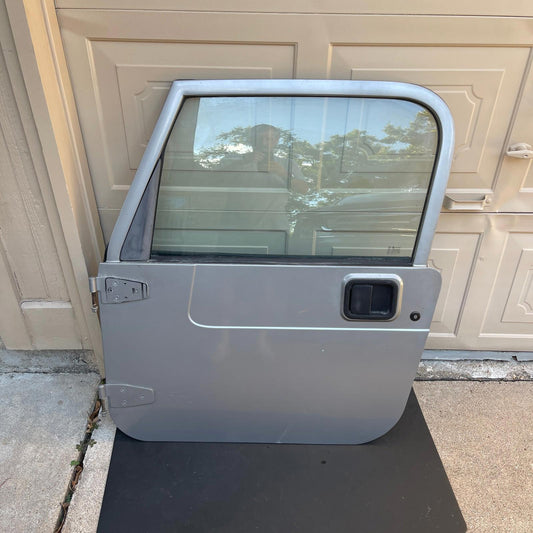 (NO SHIPPING) Driver Left Front Door Half Door Fits 97-06 WRANGLER 1046704